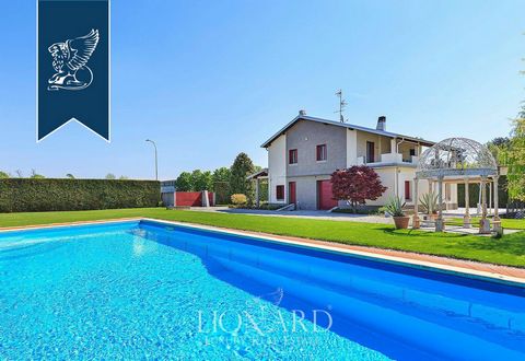 In the province of Milan, close to Malpensa's international airport, there is this luxurious modern villa with a park and pool for sale. Renovated in 2011, this villa is in a modern architectural style, featuring elegant interiors and fit with t...