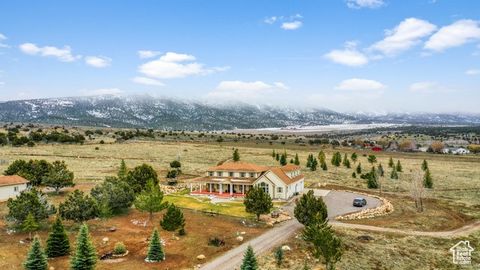 Discover an extraordinary opportunity to own a stunning estate set on nearly 50 acres of peaceful, low-maintenance land, just minutes from the historic charm of Spring City. Whether you're seeking a primary residence, a weekend retreat, or a remarkab...