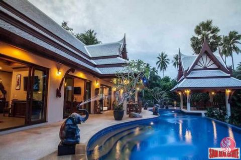 This gorgeous modern Thai style pool villa is extremely private and has extraordinary mountain views. The huge 100 meter freeform swimming pool continues out to a private lake with a limestone karst background giving it a private, yet dramatic atmosp...