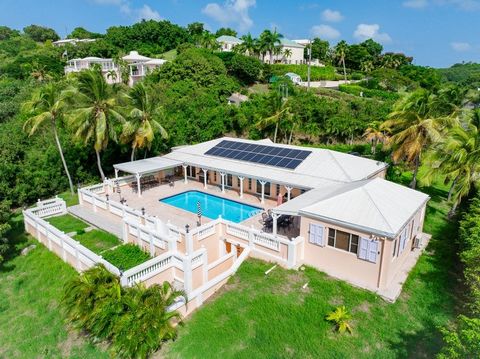 This 3-bedroom, 3-bathroom island villa with a large refreshing pool and solar in the gated BEACHFRONT community of Shoys offers a spacious indoor-outdoor living experience, creating a serene oasis for relaxation. Inside, the open-concept design blen...