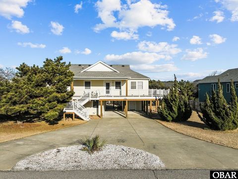 This 4 bedroom 3 bath single owner home is too good to pass up! This home has never been in a rental program. This lovingly cared for second home with ocean views is ideal as a primary, secondary, or investment home. On the ground floor there is an o...