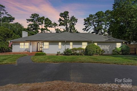 The perfect blend of original character & modern updates. As you step inside you are greeted by original hardwood floors that exude warmth & character. The remodeled kitchen features elegant Italian porcelain countertops, & top-of-the-line JennAir ap...