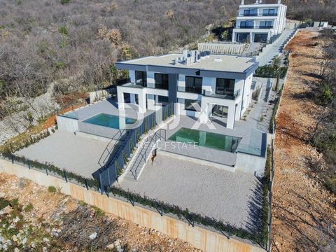 Location: Primorsko-goranska županija, Kostrena, Kostrena Sveta Barbara. RIJEKA, KOSTRENA - exclusive duplex villa with infinity pool, garage, garden, panoramic sea view We exclusively present a unique opportunity - a special modern fenced building l...