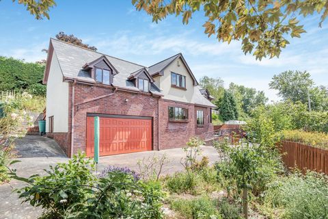 Key Features: Heading inside, the entrance hall has stairs rising to the first floor with beautiful handwoven wool carpet, and slate tiled flooring downstairs. From here, there is access to the downstairs W.C. and doors to the sitting room, dining ro...