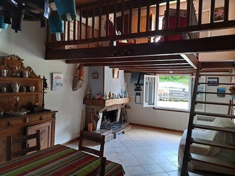 Village house with adjoining garden and garage consisting of a main house and an independent accommodation. The main house is composed on the ground floor of an equipped kitchen, a living room with fireplace, a bathroom and a toilet. Upstairs, a bedr...