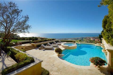 Inspired by the private villas of Europe's romantic Mediterranean region, this sublime custom residence in Crystal Cove's guard-gated Estate Collection has it all, from fabulous ocean views and top-tier appointments to generous space and lush grounds...