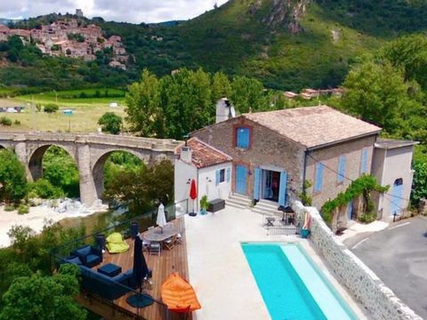 EXCLUSIVE TO BEAUX VILLAGES! Nestled above the banks of a swimming and fishing river in Southern France in Occitanie / Languedoc-Roussillon, and surrounded by the spectacular scenery of the gorge, you will find this renovated stone property with pool...