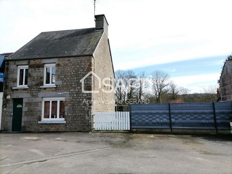 Located just 2 minutes from Mortain (with supermarkets, hospital, high school, outdoor swimming pool, cinema, market on Saturday mornings...), come and enjoy this beautiful stone house comprising on the ground floor: living room/lounge opening onto a...