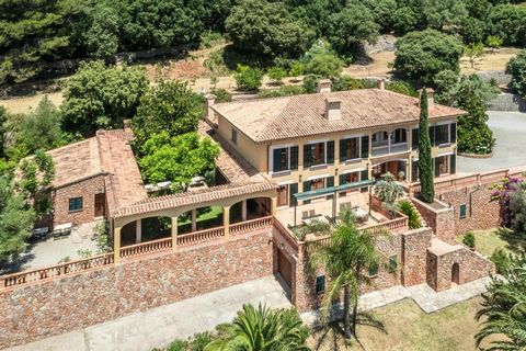 This manorial luxury property is located in the picturesque valley of Mallorca. When the gate to the property is opened, the visitor enters a different world: a beautiful forest trail, extremely well maintained, leads to the house which is slightly e...