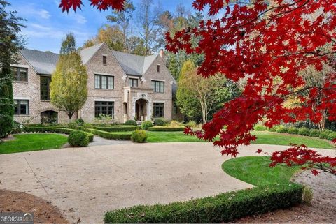 Nestled at the end of a tranquil lane in the prestigious enclave of Buckhead, this meticulously crafted custom estate spans over 2.1 acres of lush, level grounds. Designed by the renowned architects Harrison Design and completed in 2014, and then the...