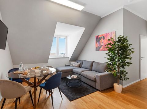 Welcome to our luxurious two-bedroom penthouse with terrace in Vienna! This stunning apartment offers a panoramic city view and is situated right next to the beautiful local recreation area 