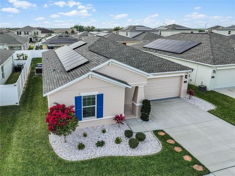Here's your golden opportunity to own a beautiful Central Florida pool home, that can be purchased with NO MONEY DOWN! Oh, let me also mention the SOLAR PANELS are PAID OFF!! This meticulously maintained 3-bedroom, 2-bathroom home exemplifies comfort...