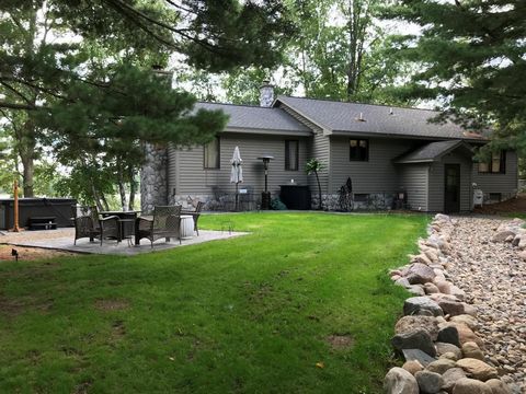 Don't miss this four bedroom, two bathroom Arrowhead Lake home on the Whitefish Chain! You will love the private setting of mature pine trees, 1.3 acres, and 175 feet of lake frontage. This home features a stone fireplace, vaulted ceilings, pine wood...