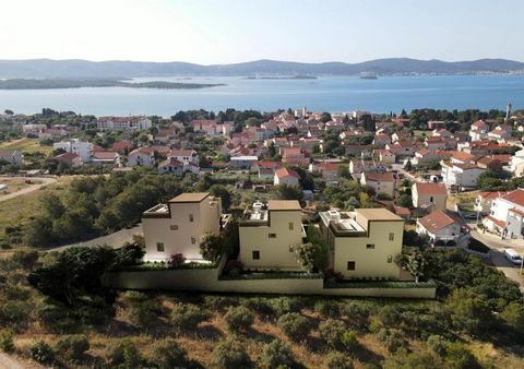 Complex of three luxurious modern villas with an unobstructed view of the sea in Zadar area under construction. The complex is located in Sveti Filip i Jakov, between Zadar and Biograd na Moru, with southwest orientation. Each of the villas in a comp...