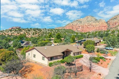 Nestled amidst the breathtaking Red Rock landscape, this exquisite 4-bedroom home invites you to experience the epitome of desert luxury living. Boasting a large lot size, this property is in a quiet, peaceful neighborhood nestled between Red Rocks a...