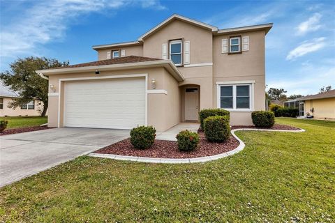 DEEP CREEK, PUNTA GORDA – RECENTLY UPDATED AND MOVE-IN READY, 2 story, 4 bedroom, 2-1/2 bath, 2-car garage, POOL home located in the desirable neighborhood of Deep Creek in Punta Gorda, with county water and sewer and NOT IN A FLOOD ZONE! The invitin...