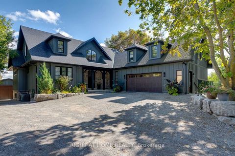 Picture Yourself Sitting On Your Outdoor Covered Deck With a Stone Fireplace on a Cool Autumn Evening or Indoors by Your Livingroom Gas Fireplace on a Cold Winters Day. This Stunning House Offers a Grand Entrance That Flows into the Livingroom and Di...