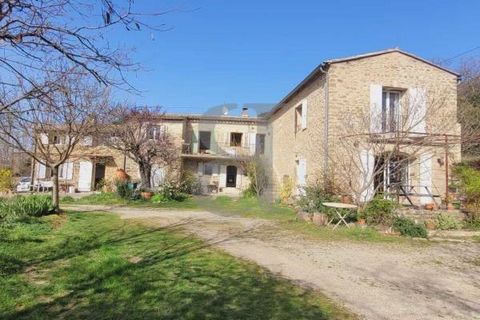 GRIGNAN Mas de caractère located in Grignan in a privileged environment with a superb view of the castle. This property comprises 4 independent dwellings. You'll love this haven of peace with its 1.7ha wooded plot, and this charming, authentic buildi...