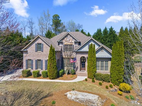 Welcome to elegant living in the highly sought after Hidden Falls neighborhood in Buford! This stunning and meticulously maintained 6BR/4.5BA home on partially finished basement, and on one of the largest lots in the subdivision, boasts uncompromisin...