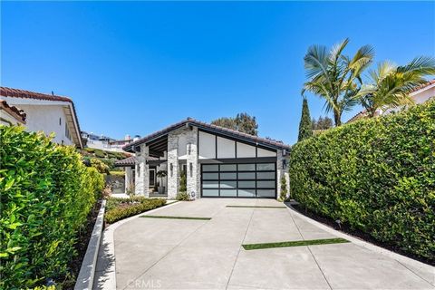 Welcome to your dream oasis in Dana Point, where luxury meets modern design in this recently remodeled single-level home nestled at the end of a tranquil cul-de-sac street. Prepare to be captivated by the expansive 9,000+ sq. ft. lot with sweeping pa...