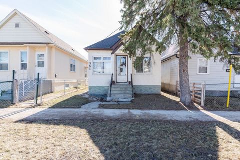 SS 4/17. Discover the charm of this inviting bungalow, featuring three bedrooms and a full bathroom on the main floor, along with spacious living and dining areas. The kitchen boasts freshly painted white cabinets which provide ample storage space. C...