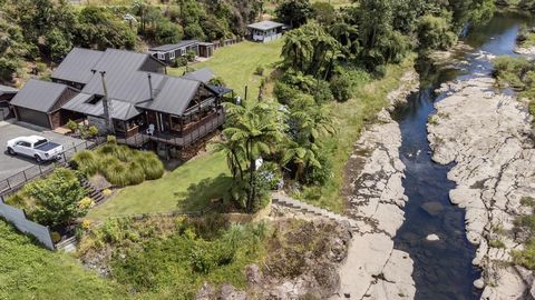 Act fast - this unique riverside property is your chance to combine natural beauty with modern living. Perched above the Wairoa River, this secluded home offers a variety of activities: swim, kayak, fish, or simply enjoy stunning views from your livi...