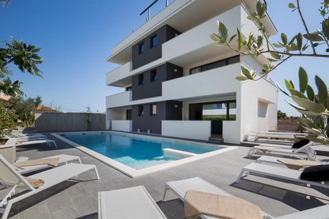 Location:Zadar Built: 2018, 2013 City center: 3 km Sea: 2.9 km Airport distance: 10 km Inside space: 920 m2 Plot size: 1200 m2 Bedrooms: 18 Bathrooms: 17 4Bed Apartment Swimming pool: 65 m2 Parking: 17 Air-conditioner Cameras Patio Garden