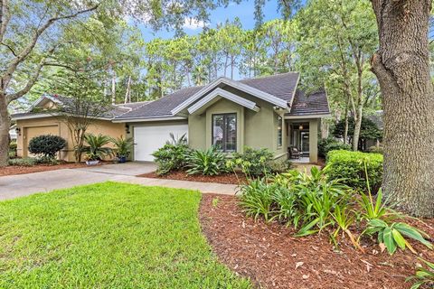 Discover this charming single-story home in the short term rental-restricted community of St. Andrews. Sellers are in process of replacing the roof and painting exterior. Hurry to pick your own colors! Enjoy a serene natural backdrop with a back deck...