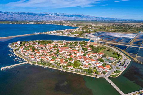 www.biliskov.com ID:14959-1Zadar County, NinBuilding land near the sea, surface area of 2086 m². The plot allows for the construction of a building up to 2500 BRP. Construction conditions: The minimum plot size for new buildings is 150 m². Maximum pl...