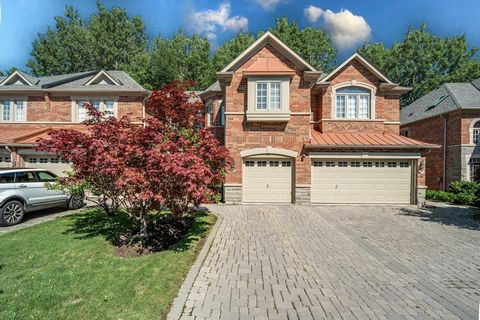 Welcome To This Immaculately Kept Executive Townhome In The Luxurious Enclave Of Westbrook. This Wycliffe Built Home Is 2130 Sqft & Sits On A Rare 176Ft Deep Ravine Lot. Feat 9 Ft Ceilings, Wainscotting, Hardwood Flrs, Kitchen With Plenty Of Function...