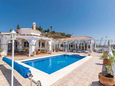 Stunning holiday villa with private swimming pool and apartment offering superb views over the surrounding countryside, up to the impressive Sierras and down to the Mediterranean and across to the coast of Africa. The property is less than fifteen mi...