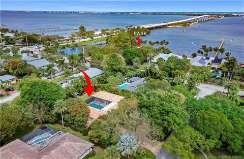 Exquisite luxury residence nestled in the tranquil and highly sought-after neighborhood of South Sewalls Point. This serene pool home is situated on an expansive, lushly landscaped lot, providing a picturesque and private retreat. Over 3300 total sqf...
