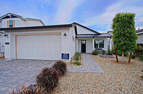 Don't wait, this Del Ray Farmhouse at Sterling Grove Golf & Country Club in Beautiful Surprise, Arizona! Ask about the Interest Rate Buydown on this property. Over $200k in upgrades, Ready to move into this Upgraded is complete and ready. This Farmho...