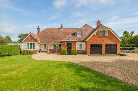 Guide Price £1,000,000 to £1,100,000. Fine & Country are delighted to offer a beautifully presented spacious four bedroom family home, situated in a semi rural location on a plot 3.7 acres (TBV). The property offers double garage, parking for numerou...