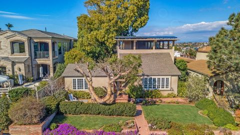 Situated in one of Point Loma's most desirable areas, this stunning home offers sweeping bay views, timeless hardwood-floors and charming details at every turn.Top floor living space has panoramic views and opens to a spacious covered rooftop-deck pe...