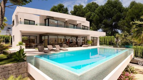Villa Tranquille en Bord de Mer Près de la Plage à Moraira Teulada Cette villa de luxe est située dans la charmante ville de Moraira, nichée au nord de la province d'Alicante. Cette région, également connue sous le nom de Costa Blanca, est une destin...