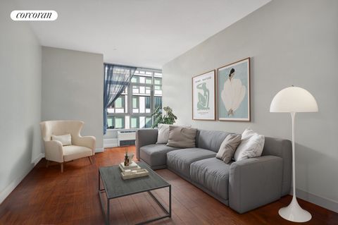 Welcome to the highly sought after Powerhouse Condominium. This incredibly spacious, peaceful, well appointed 1 bedroom 1 bath home is over 850 square feet of luxury. With 10 foot high ceilings, huge windows, sleek modern design, state of the art app...