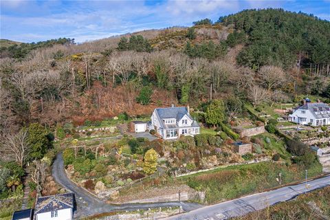 On the market for the first time in over 30 years, Bryncoed is an impressive, detached property with distinctive architectural features, set within generous grounds and enjoying an elevated, private position from the coast road to take full advantage...