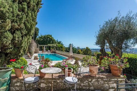 SOLE AGENT - Located in a sought-after residential area, just a few steps from the village, this magnificent stone property, designed by renowned architect Svetchine, sits on approximately 2.620 sqm of land offering panoramic views of the sea and hil...