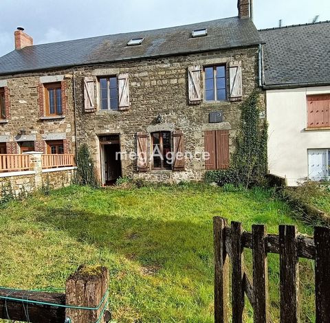 Village of St Calais du Désert, 7 km from Pré en Pail (53). Sandrine MURATI offers you this semi-detached town house, made of stone and covered in slate, of approximately 80 m² and 29 m² of convertible attic space. This house was the birthplace of th...