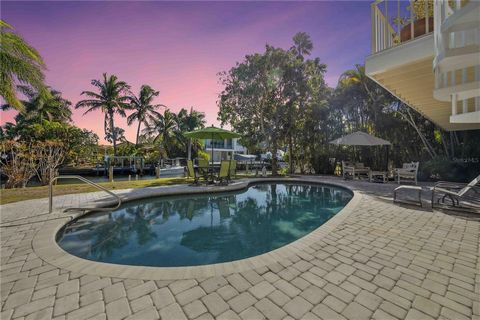 Embark on a journey to the pinnacle of South Florida luxury living at 614 Norton Street, Longboat Key, Florida 34228. This six-bedroom, five full baths, one half bath dream home has undergone meticulous upgrades, including the replacement of all 4 AC...