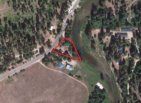River front property north of Garden Valley, Idaho, surrounded by the Boise National Forest. This nearly half acre property along the Middle Fork Payette River, presents an enticing opportunity to construct your dream home. Year-round accessibility a...