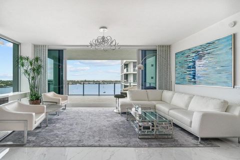 This contemporary 12th floor Water Club condo offers mesmerizing panoramic views of the intracoastal and ocean and a country club lifestyle without the headaches and fees. Located in a highly sought after pet-friendly building, 1 Water Club Way #1204...