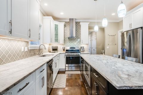 Upon entry, the foyer welcomes with its bright atmosphere and 2 large hall closets, setting the tone for what lies ahead.Discover the heart of the home, a well-appointed kitchen boasting stainless steel appliances, stylish cabinetry, and a spacious c...