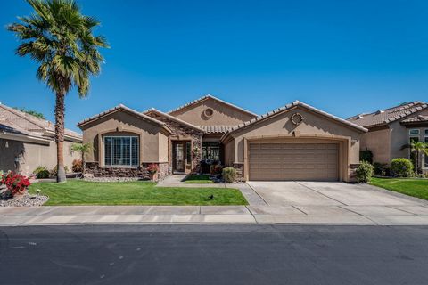 Welcome to your dream home in Heritage Palms Country Club, situated near the charm of North La Quinta. This meticulously crafted Hoylake Model offers 2172 sq. ft. of living space. Step inside and discover a rare gem featuring not one, but two large m...
