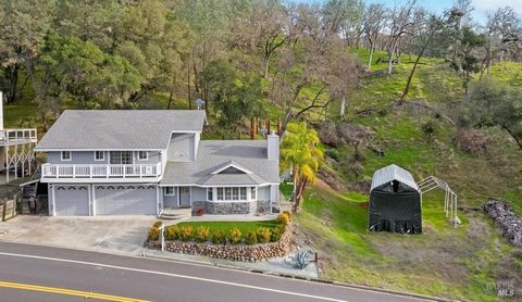 Lakeview Oasis in Berryessa Highlands! Lake Berryessa dream home awaits! This stunning 3-bedroom, 2.5-bath home offers 1832 sq. ft. of beautifully designed living space on a sprawling .58-acre lot in the desirable Berryessa Highlands. Enjoy breathtak...