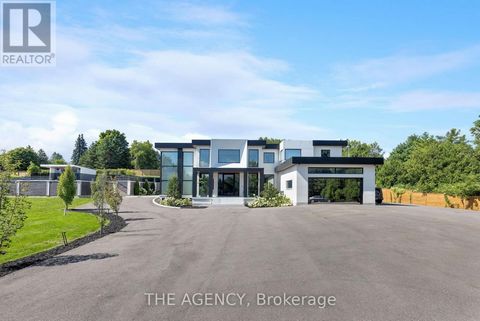 Experience the pinnacle of contemporary luxury in this stunning estate, elegantly set on over 3 acres in sun-drenched Caledon. Spanning approximately 10,000 square feet, this meticulously designed residence redefines sophisticated living. Enter throu...