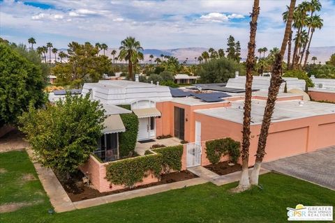 Welcome to your dream home in Marrakesh Country Club designed by the iconic John Elgin Woolf, the visionary behind Hollywood Regency architecture, this stunning three-bedroom, three-bath residence showcases timeless elegance and sophistication. As th...