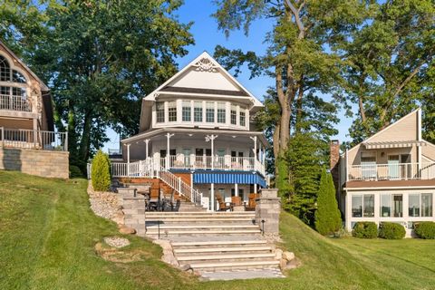 Indulge in luxurious lakeside living in this fully remodeled home, showcasing a harmonious blend of modern elegance and natural beauty. A chef's dream kitchen, complete with top-of-the-line appliances, quartz countertops and soft close cabinets, sets...