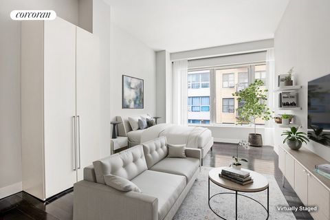 Welcome home to this lovely modern studio apartment at 111 Fulton Street in the heart of the Financial District. Unit 822 offers loft-style living with 11'4